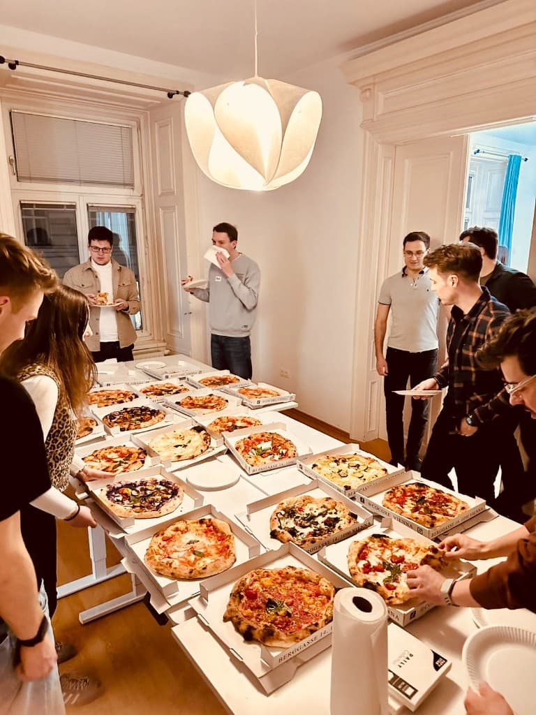 Pizza and networking at Cursor Vienna meetup